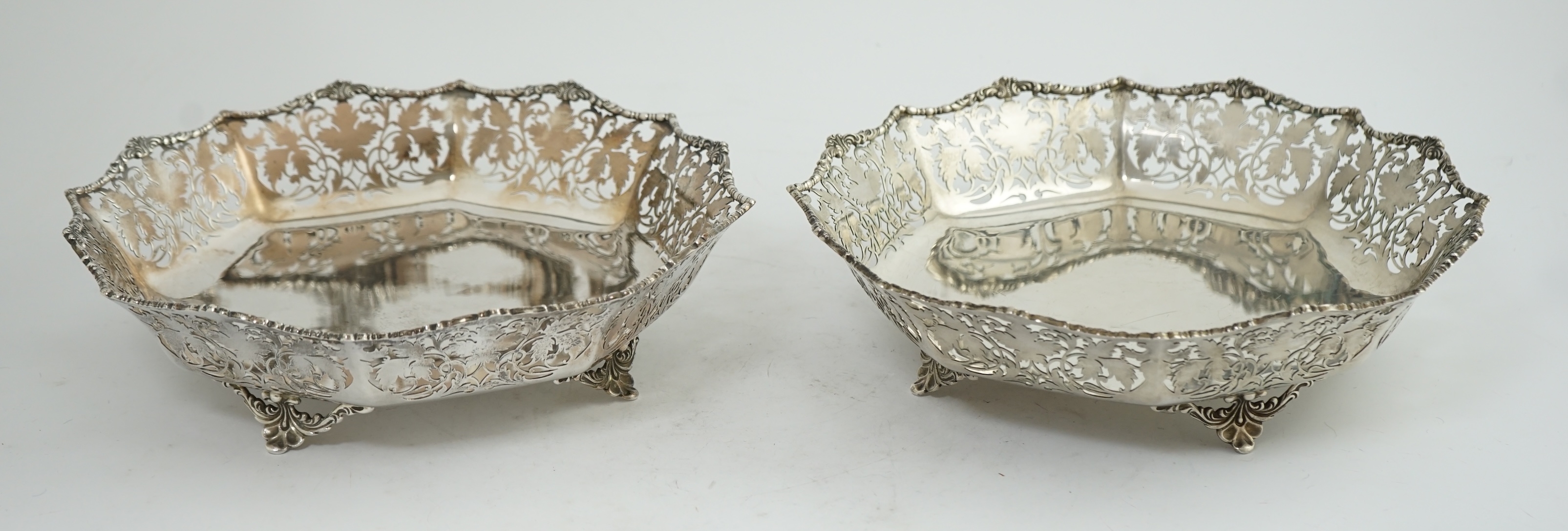 A pair of George VI pierced silver shallow circular fruit bowls, by Mappin & Webb